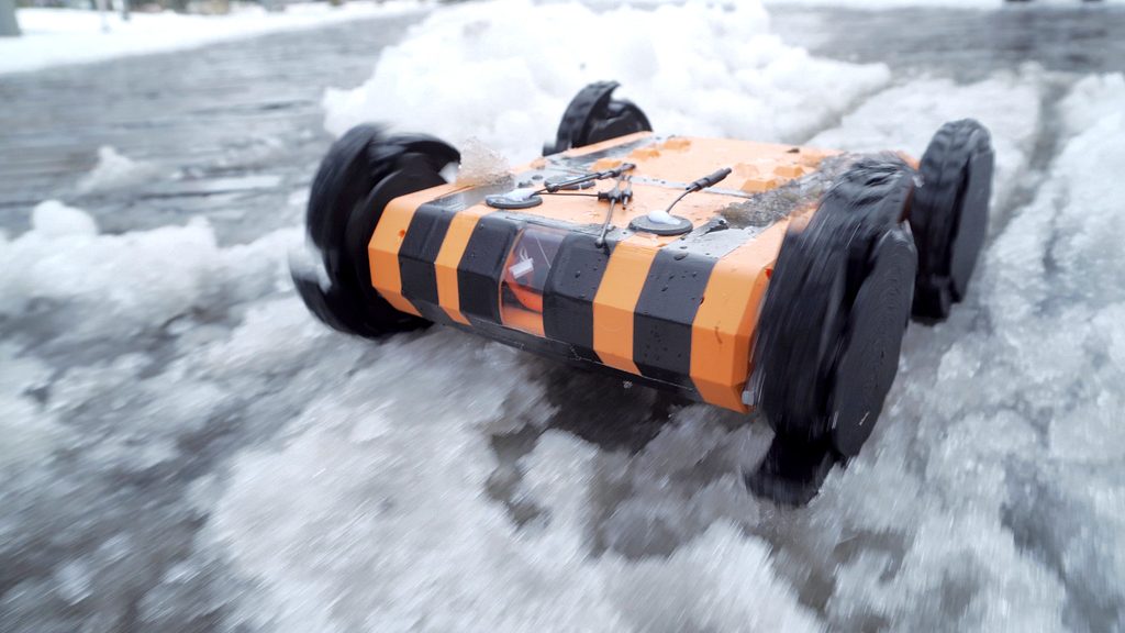 The Outdoor-UGV, a 3D-printed unmanned ground vehicle, on snow during a field test